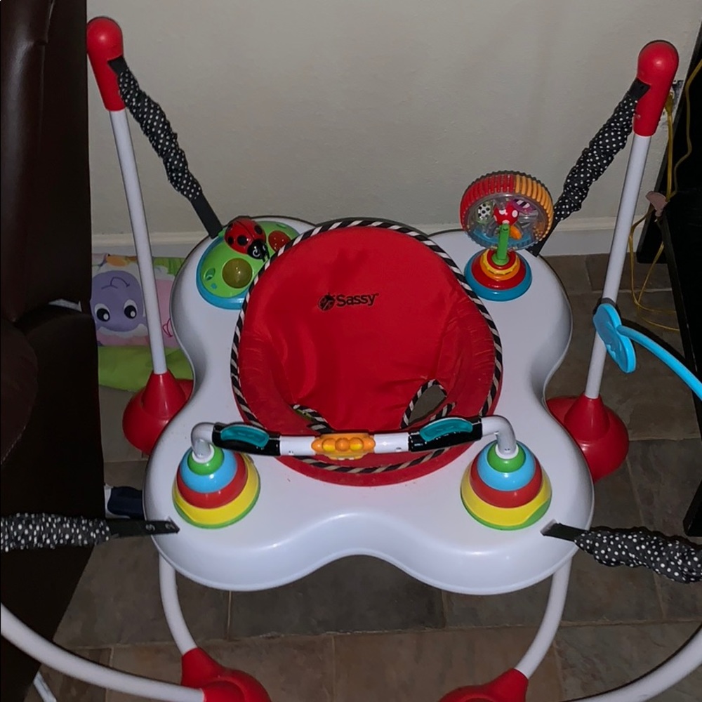 Baby bouncer chair — made by sassy